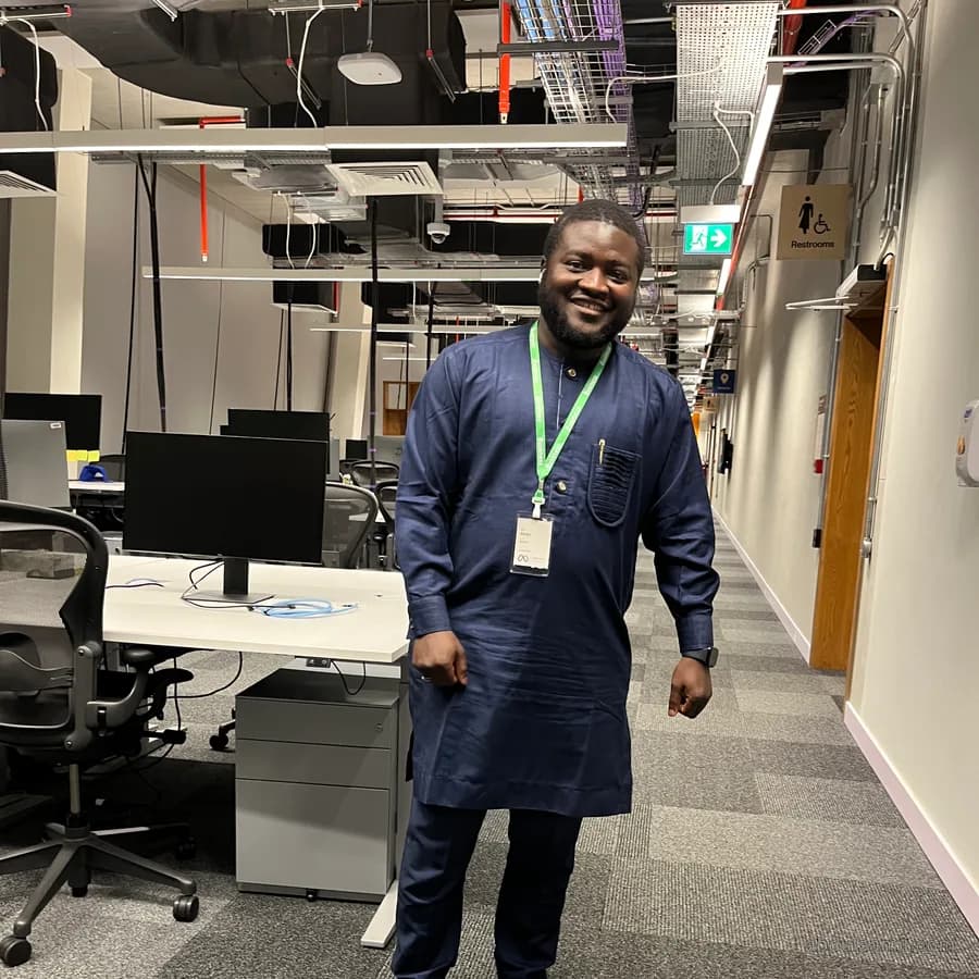 Abdulsamii standing in an open-plan office